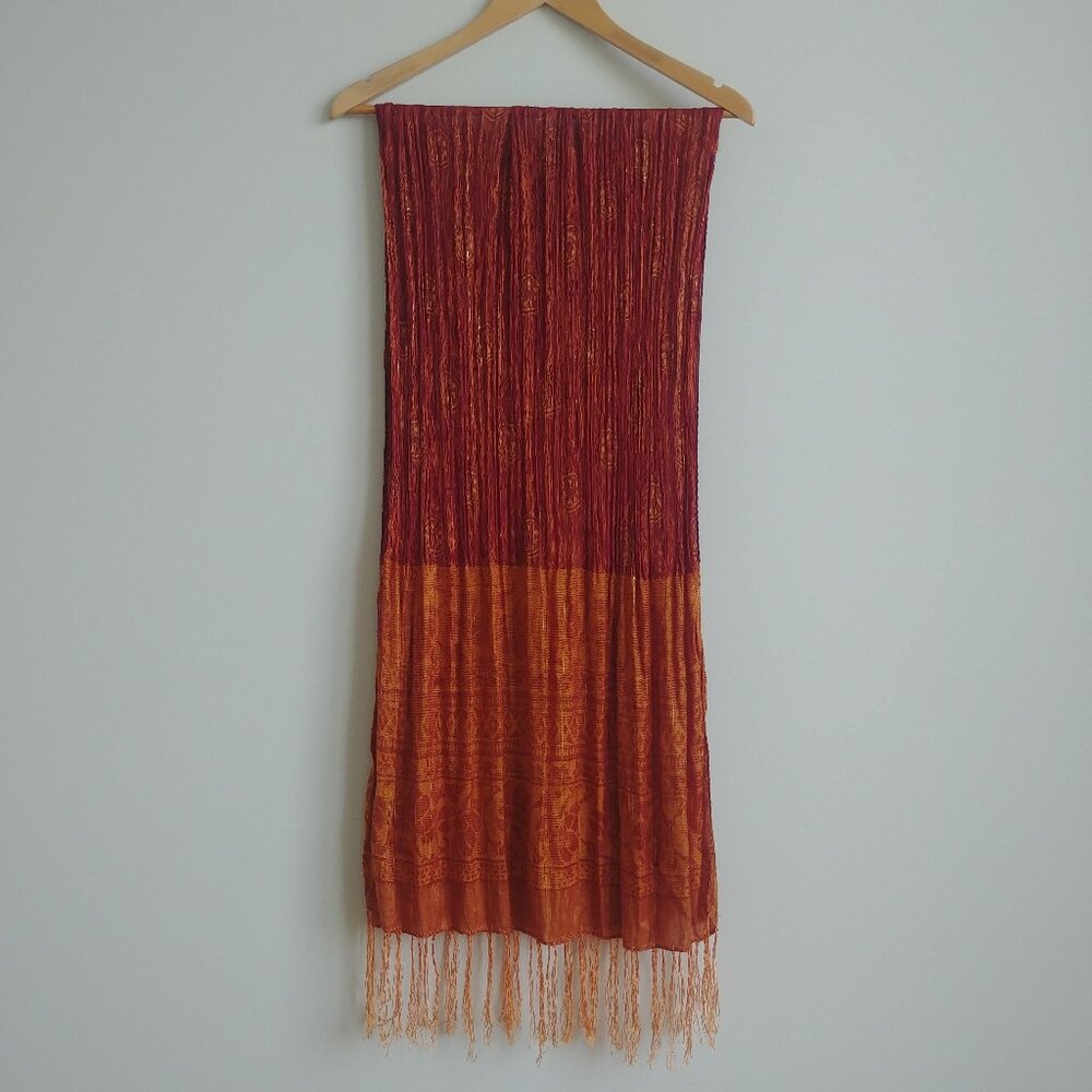 Red orange and gold silky semi sheer scarf with fringe